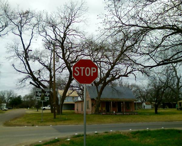 Stop Sign in Iredell, Texas, by John Cunyus